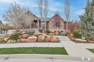 View of front of house with brick siding