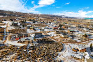 Drone / aerial view featuring a mountain view