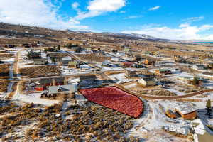 Birds eye view of property with a mountain view