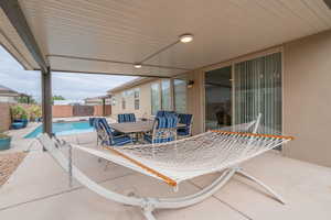 View of patio / terrace featuring a fenced in pool