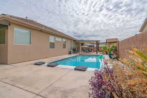 View of pool with a patio area