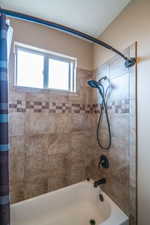 Bathroom featuring shower / bath combo