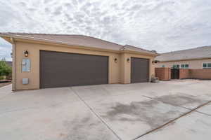 View of front of property featuring a garage