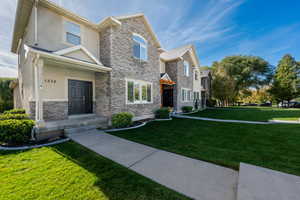 View of front facade with a front lawn