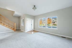 View of carpeted foyer entrance