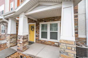 Entrance to property with central air condition unit