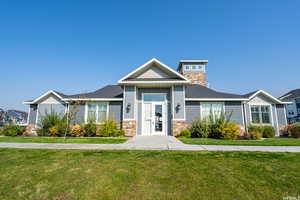 View of front of home featuring a front yard