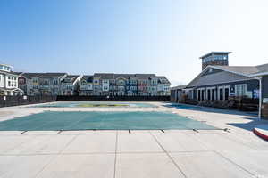 View of swimming pool featuring a patio