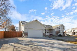 Single story home with a garage