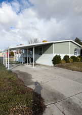 View of front of home featuring a carport