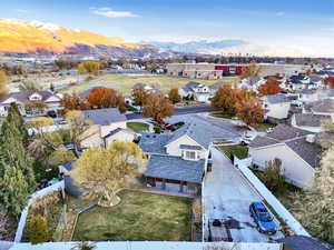 Birds eye view of property with a mountain view