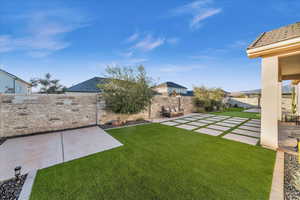 View of yard with a patio