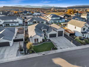 Birds eye view of property with a mountain view