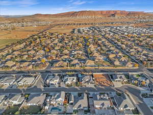 Birds eye view of property with a mountain view