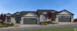 View of front facade featuring a garage