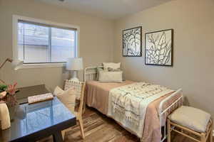 Bedroom featuring hardwood / wood-style floors