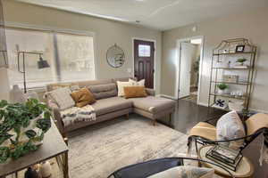 Living room featuring hardwood / wood-style floors