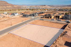 Birds eye view of property with a mountain view