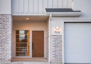 Entrance to property with a garage