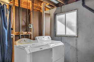 Laundry room featuring washer and dryer