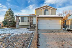 Front of property with a garage