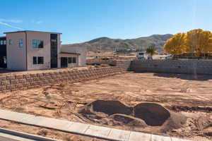 View of yard with a mountain view