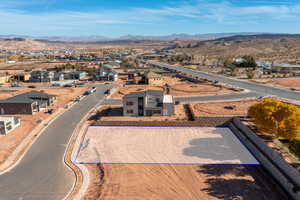 Birds eye view of property with a mountain view