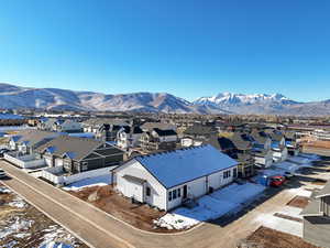 Snowy aerial view with a mountain view