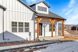 View of front of house featuring a mountain view