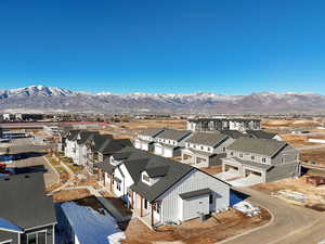 Birds eye view of property with a mountain view