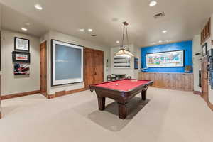 Rec room with light colored carpet and billiards