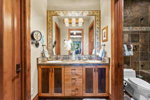 Bathroom with vanity and toilet