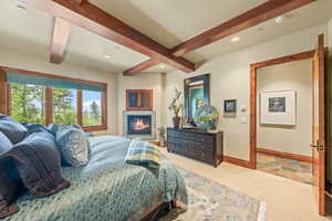 Bedroom with beam ceiling