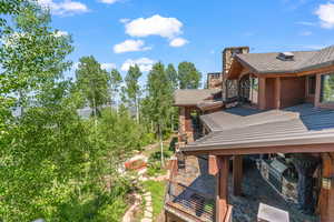 View of yard featuring area for grilling and a patio area