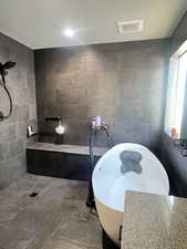 Bathroom with tile walls