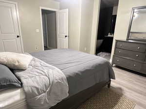 Bedroom featuring light wood-type flooring