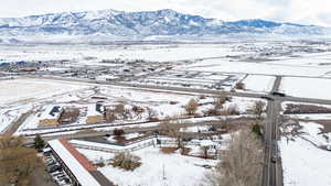 Snowy aerial view with a mountain view