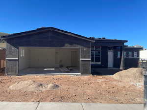 View of front of home featuring a patio area