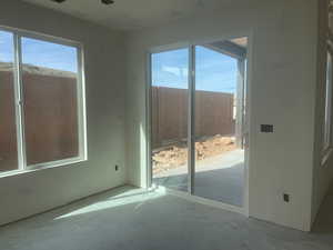 Empty room featuring concrete flooring