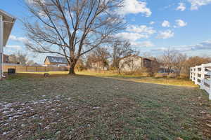 View of yard with central AC unit