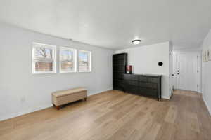 Living area featuring light hardwood / wood-style floors