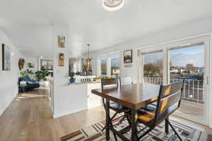 Dining room featuring a textured ceiling and light hardwood / wood-style flooring