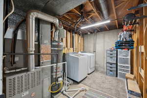 Basement with independent washer and dryer and gas water heater