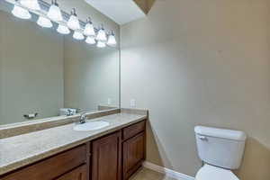 Bathroom with vanity and toilet