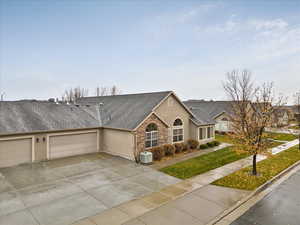 Ranch-style home featuring a garage