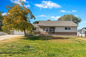 View of front of home with a front yard