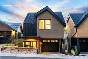 View of front of home featuring a garage