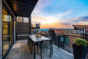 View of balcony at dusk