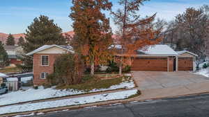 View of front of house with a garage