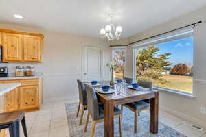 Tiled dining area with spectacular views of the lake and mountains